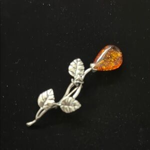 Elegant Silver Leaf Brooch with Amber Accent